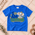 I AM Kids strong design on a Royal shirt, shown on a cream rug.
