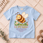 I AM Kids Bee design on a Light Blue shirt, shown on a cream rug.