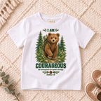 I AM COURAGEOUS woodland bear design on a White kids shirt on a cream rug.