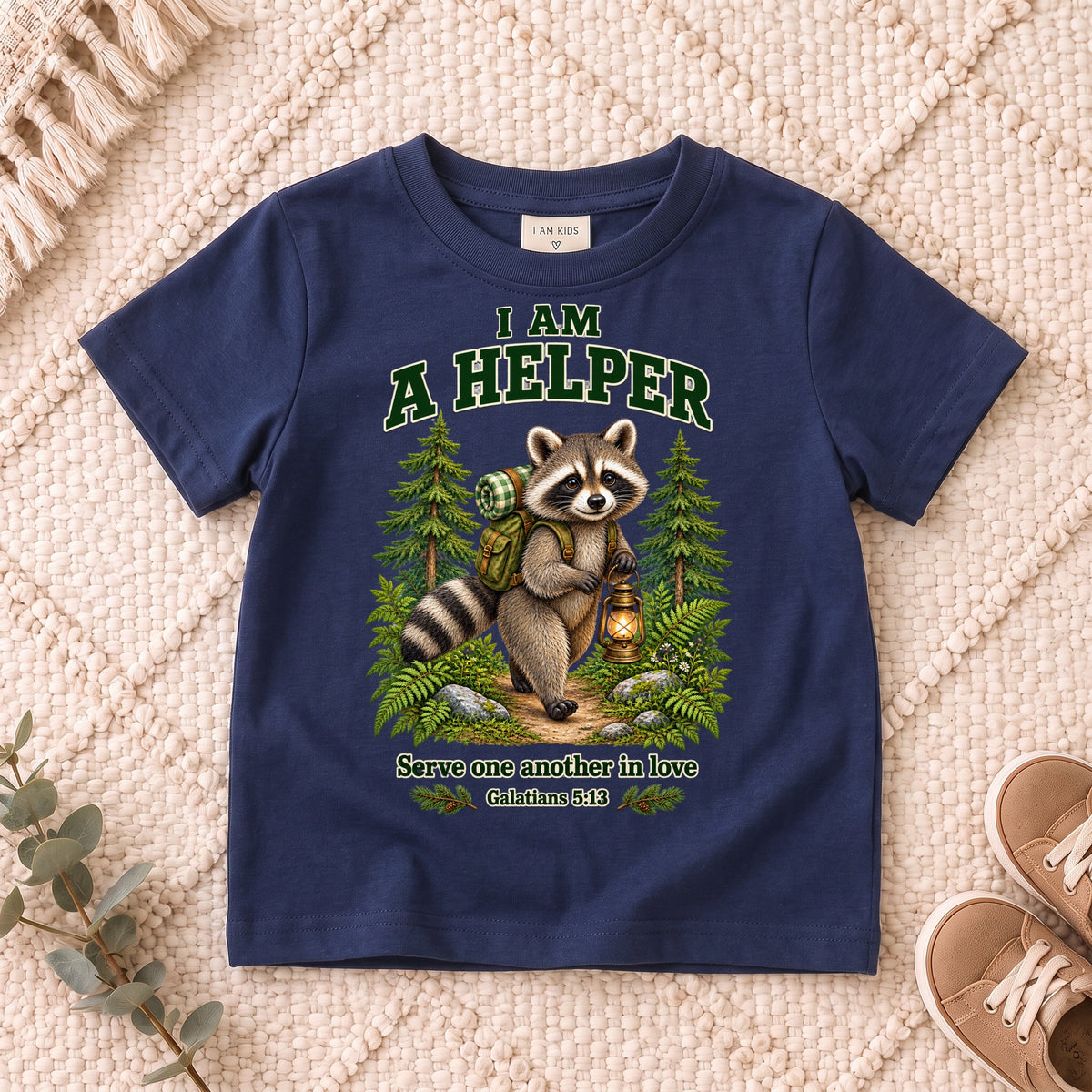 I AM Kids helper design on a Navy shirt, shown on a cream rug.