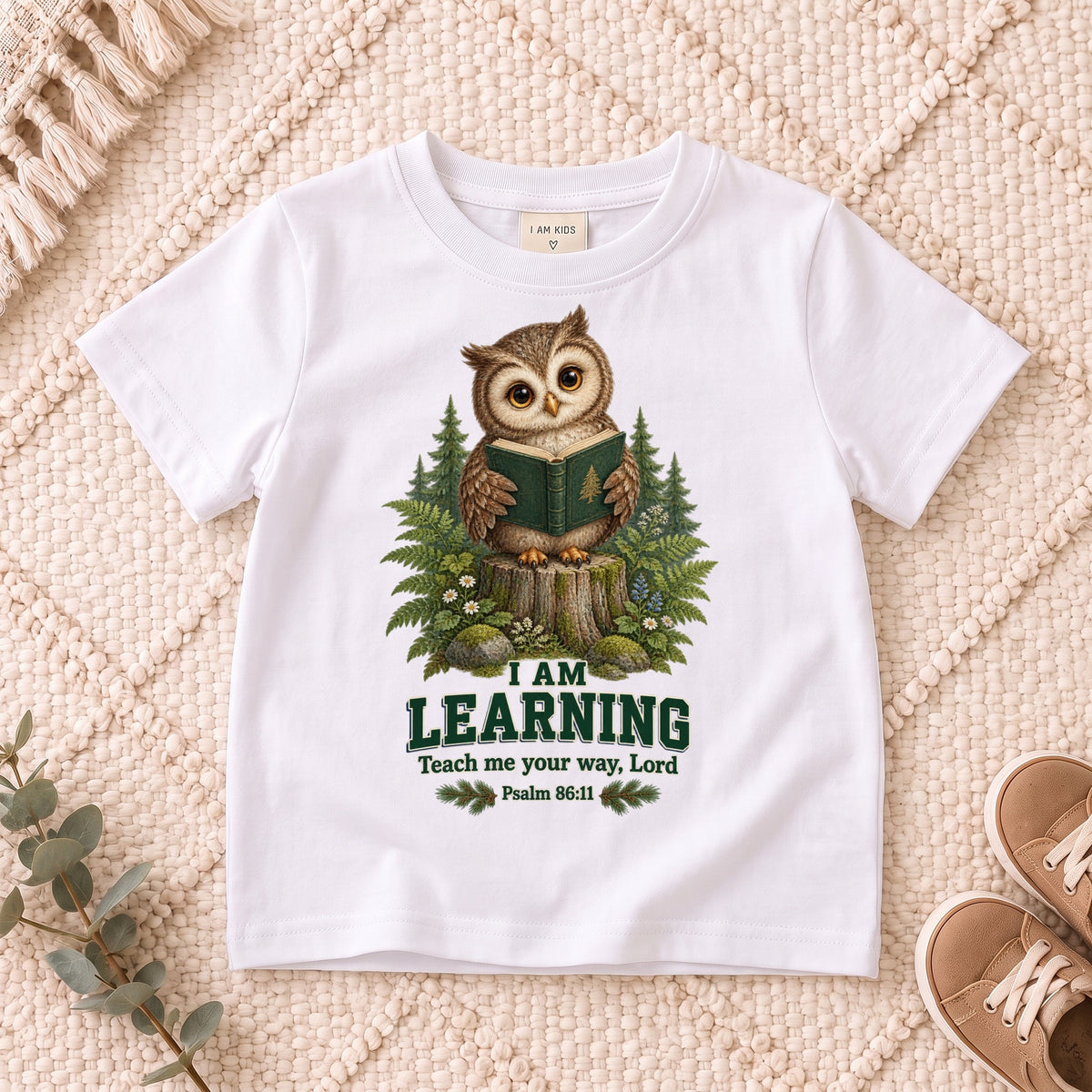 I AM Kids owl2 design on a White shirt, shown on a cream rug.