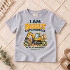 I AM Kids built truck design on a Sport Grey shirt, shown on a cream rug.