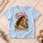 I AM Kids Horse Guided design on a Light Blue shirt, shown on a cream rug.