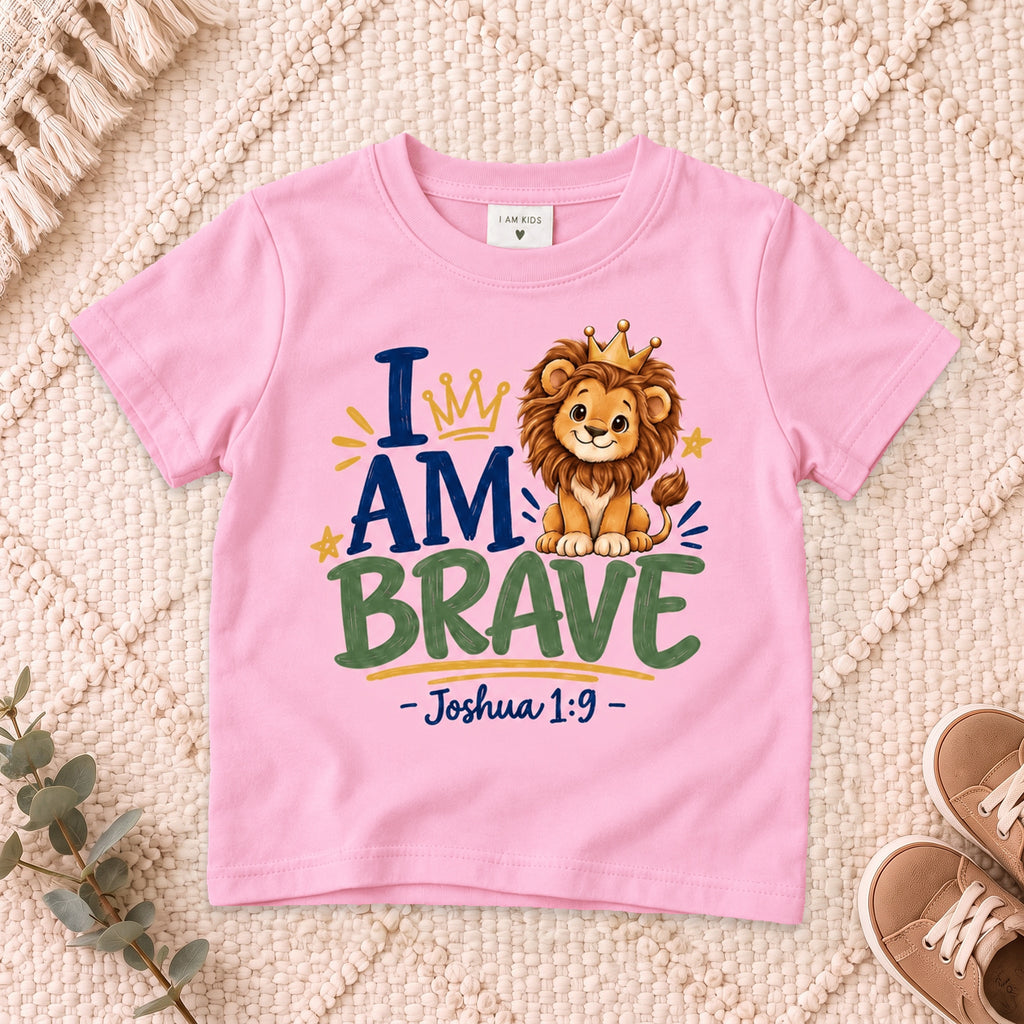 I AM Kids 2I AM BRAVE Lion Toddler T-Shirt | Joshua 1:9 - copy design on a Light Pink shirt, shown on a cream rug.
