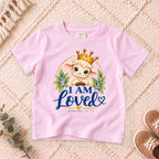 I AM Kids I AM LOVED Lamb Toddler T-Shirt | Ephesians 1:4 - copy design on a Light Pink shirt, shown on a cream rug.