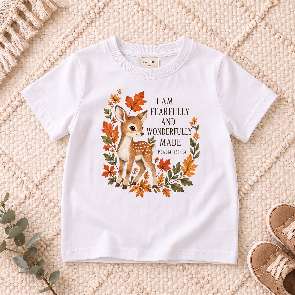 I AM Kids Deer design on a White shirt, shown on a cream rug.