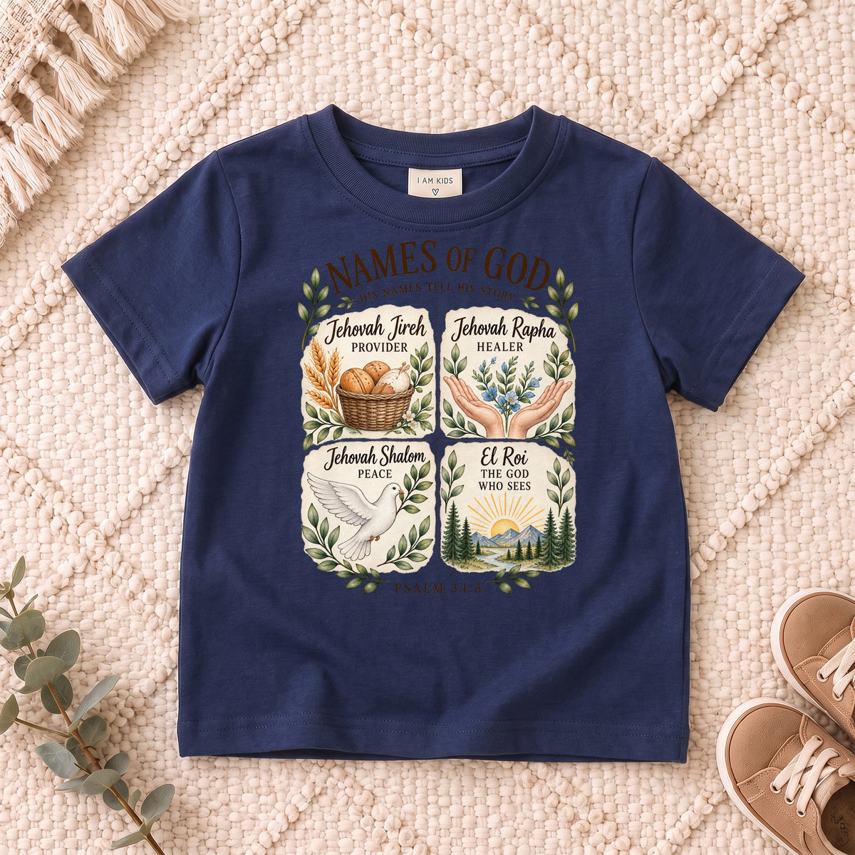 I AM Kids names design on a Navy shirt, shown on a cream rug.