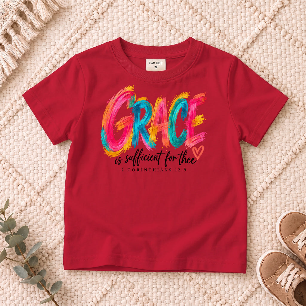 I AM Kids grace design on a Red shirt, shown on a cream rug.