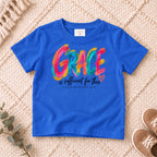 I AM Kids grace design on a Royal shirt, shown on a cream rug.