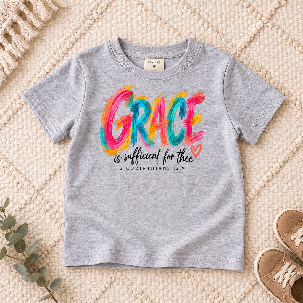I AM Kids grace design on a Sport Grey shirt, shown on a cream rug.