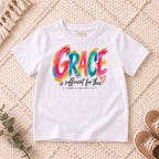 I AM Kids grace design on a White shirt, shown on a cream rug.