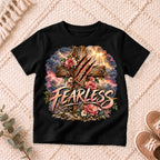 I AM Kids Floral FEARLESS Cross Kids Tee design on a Black shirt, shown on a cream rug.