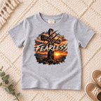 I AM Kids FEARLESS Cross Kids Tee design on a Sport Grey shirt, shown on a cream rug.