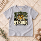 I AM Kids Be Strong & Courageous Tiger Kids Tee design on a Sport Grey shirt, shown on a cream rug.